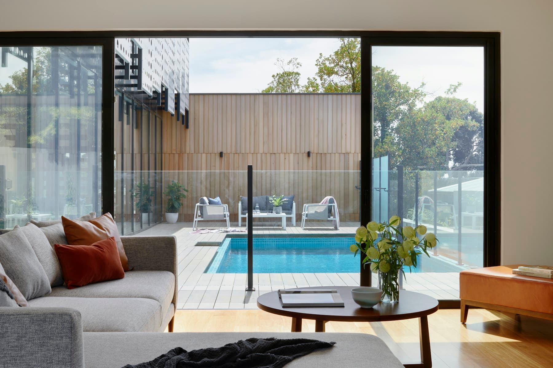 Living room opening to the pool terrace